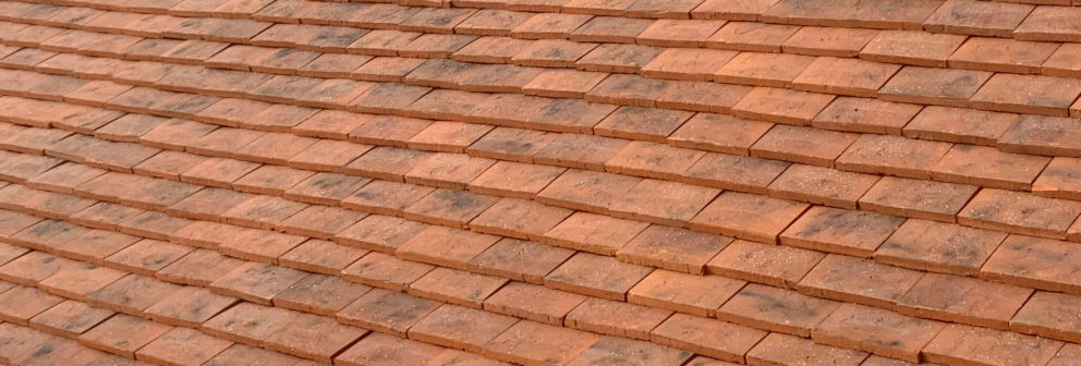 Flat clay tiles on a roof